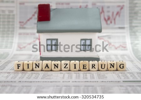 financing word on a newspaper background