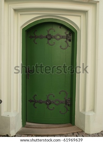 partly decorative wooden doors to the rooms in the castle