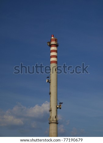 White and red high chimney smoke-free in the lead and zinc smelter
