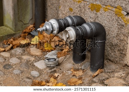 Similar – Image, Stock Photo two hydrants on old dirty wall of a house with closed blinds