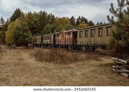 Similar – Foto Bild alter verlassener Wagon mit dem Wort Mafia aufgesprüht