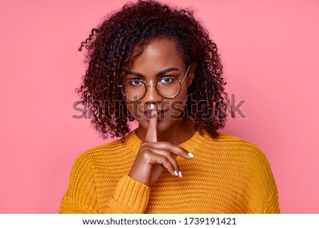 Similar – Image, Stock Photo Ethnic woman showing silence gesture in field