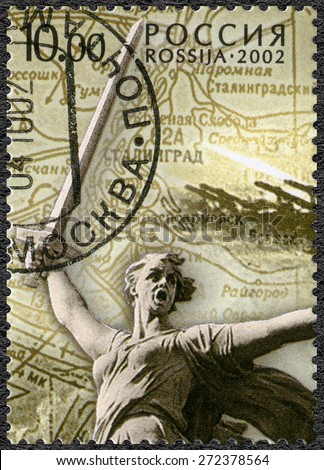 RUSSIA - CIRCA 2002: A stamp printed in Russia shows the sculpture Motherland in Stalingrad, the 60th anniversary of the Stalingrad battle, circa 2002