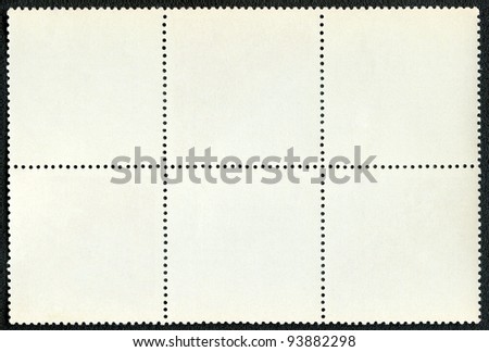 Blank postage stamps block of six framed on a black background