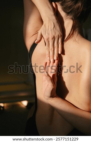 Similar – Image, Stock Photo Anonymous woman stretching body in seated forward bend position