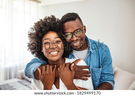 Image, Stock Photo Ethnic couple embracing against mirror in garden