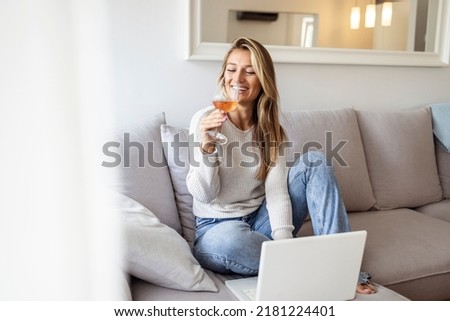 Similar – Image, Stock Photo Young woman enjoying wine near sea