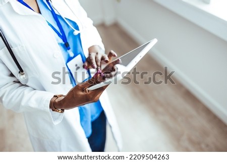 Similar – Image, Stock Photo Unrecognizable employee using professional tools for book making