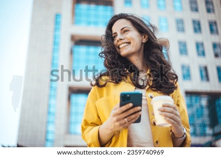 Image, Stock Photo happy young woman outdoors dancing and listening to music on mobile phone and headset. technology and lifestyle