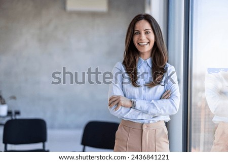 Similar – Image, Stock Photo A woman dressed in a sexy white outfit with her extremely long legs swinging under the bridge. The sky is dark blue, the bushes are green, and the mood is fine. Her fashionable blue shoes are shining from far away.