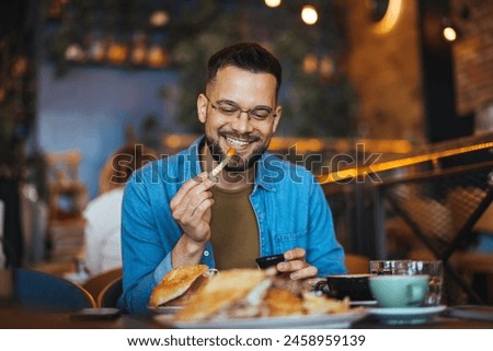 Similar – Foto Bild Mann beim Essen auf Terrasse mit Blick von oben