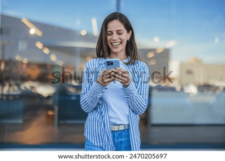 Similar – Image, Stock Photo Carefree woman using smartphone at home