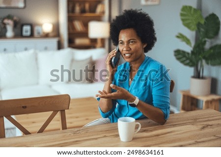 Similar – Image, Stock Photo Positive African American woman on couch at home