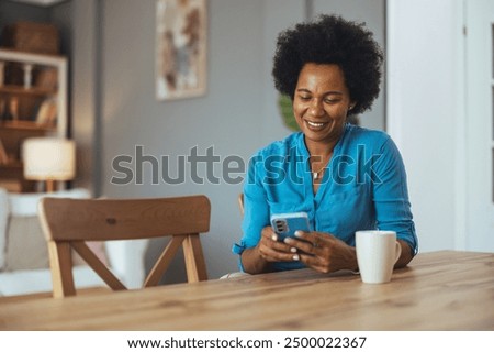 Similar – Black woman using mobile phone