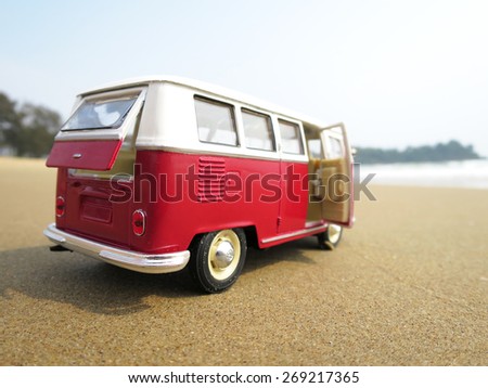 PHUKET, THAILAND - MARCH 27, 2015: Miniature VW Bulli 1962 on the beach. The cult car of the Hippie generation and it remained the status vehicle of the high wave surfers.