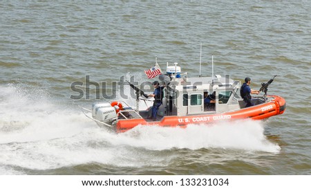 NEW YORK - SEP 3: A U.S. Coast Guard boat on patrol on September 3, 2011 near Liberty Island, New York. As of August 2009 the Coast Guard had approximately 42,000 men and women on active duty.