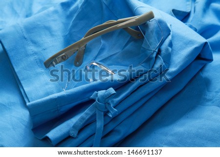 a doctors clothing with glasses