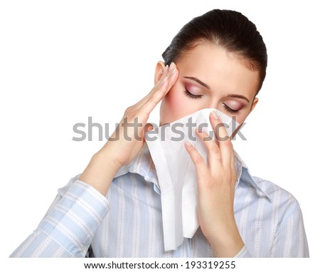Sick woman blowing her nose, white background