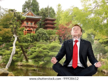 businessman in japan garden do yoga exercise