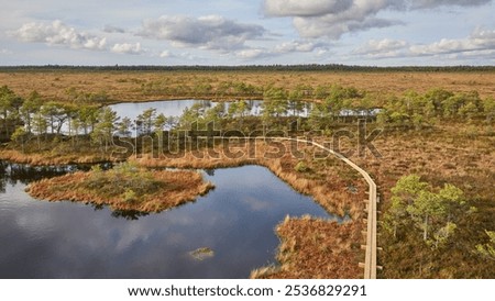 Similar – Wooden planked footway in calm evening lake