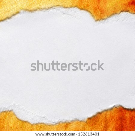 A piece of paper on stained background