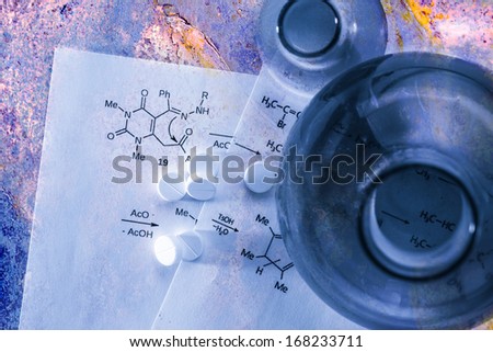 Chemistry reaction formula with white pills