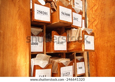 Drawer with business papers organized in archive