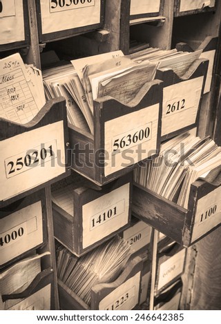 Drawer with business papers organized in archive