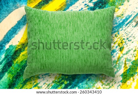 Soft blank green pillow on watercolor background