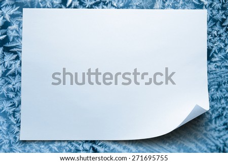 Blank sheet of paper on ice frozen background