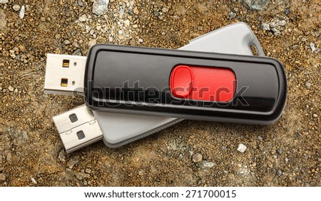 Usb flash drives on the ground background