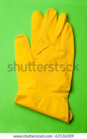 Glove isolated on green background