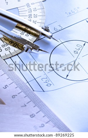 A piece of draft with drafting instrument