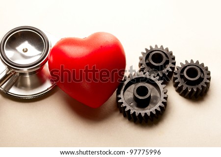 Mechanical ratchets, stethoscope and red heart