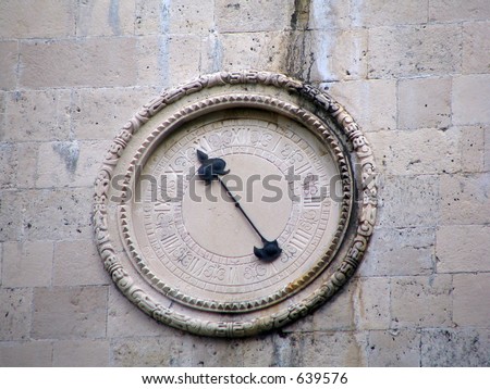 ancient time keeper, sun watch on the fortress wall
