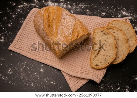 Similar – Foto Bild Frisch geschnittenes Brot auf Holztablett