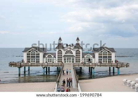SELLIN, GERMANY - JUNE 23, 2012: Pier with historical house. A famous tourist attraction on the island of Ruegen.