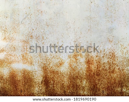 Corroded metal background. Rusted grey painted metal wall. Rusty metal background with streaks of rust. Rust stains. The metal surface rusted spots. Rystycorrosion. Stock foto © 