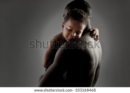 Father and son embracing warmly