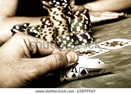 Beautiful hands holding a deck of playing cards