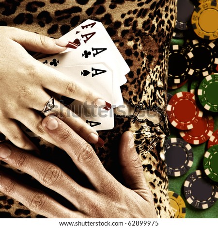 Beautiful hands holding a deck of playing cards