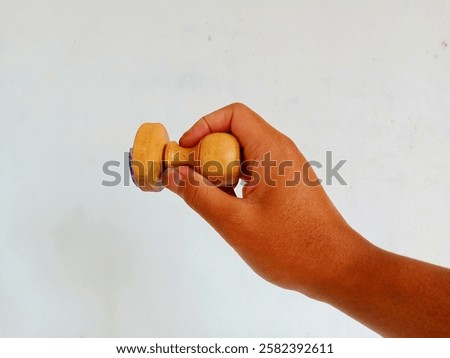 Similar – Image, Stock Photo Wooden stamp for hand printing patterns on fabric with paint. Printed fabric pattern