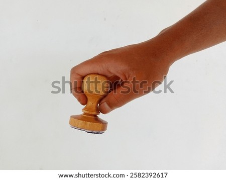 Similar – Image, Stock Photo Wooden stamp for hand printing patterns on fabric with paint. Printed fabric pattern