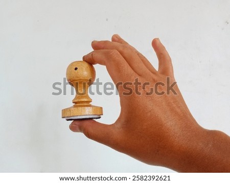 Similar – Image, Stock Photo Wooden stamp for hand printing patterns on fabric with paint. Printed fabric pattern