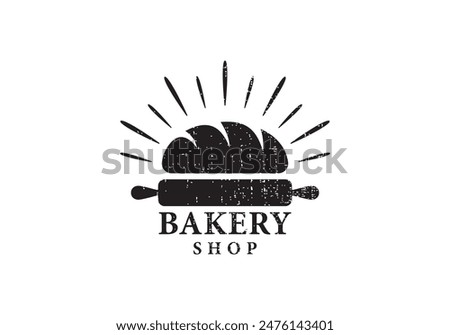 bread with rolling pin logo. classic food snack vector design