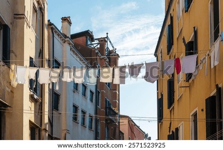 Similar – Foto Bild Historische Gebäude und Wäscheleinen in der Altstadt von Venedig in Italien