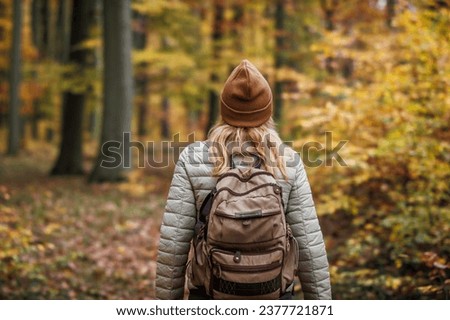 Similar – Image, Stock Photo backpacker woman hiking outdoors with cute poodle dog. Snowy mountain in winter season. nature, pets and lifestyle