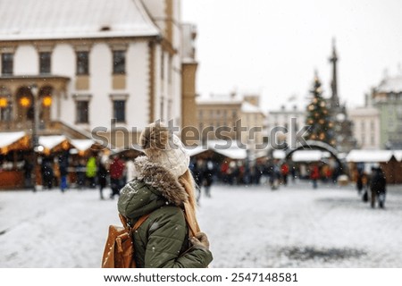 Similar – Image, Stock Photo Christmas market in the late evening with thick snowflakes