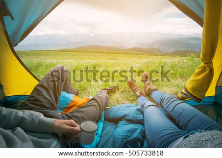 Similar – Foto Bild Zwei Personen liegen in einem Touristenzelt, Innenansicht. Füße unter den Decken im Zelt. Touristisches Lager