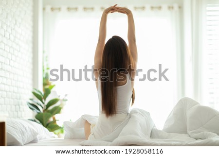 Similar – Image, Stock Photo Young woman stretching arms before working out on street